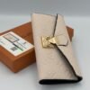 Portefeuille Louis Vuitton beige
