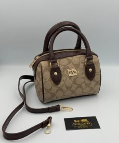 COACH SPEDDY 17CM Marron chocolat