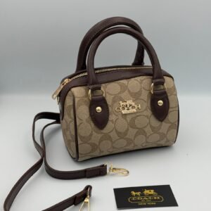COACH SPEDDY 17CM Marron chocolat